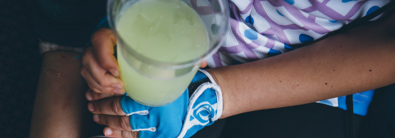 Lemonade in hand with bike glove